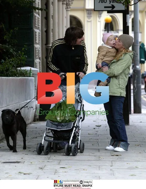 Gail Porter-Hipgrave and family stroll in London