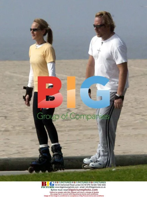 Helen Hunt rollerblades with boyfriend