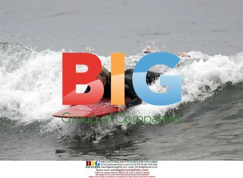 Daryl Hannah and Sean Macpherson Surfing