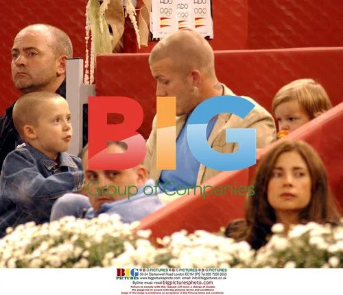 David Beckham with sons at tennis match