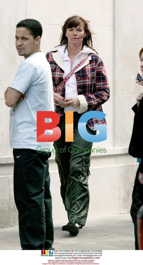 Pregnant Doon Mackichan shopping in London