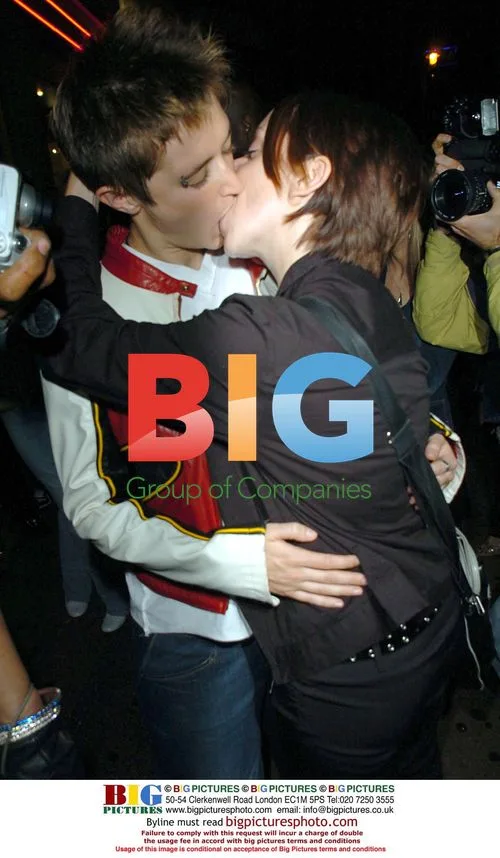 Kitten Pinder Kisses Partner Outside Cafe De Paris