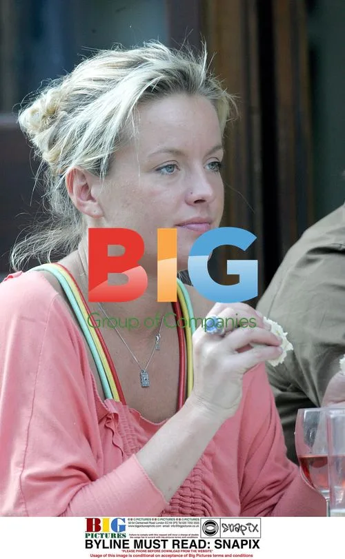 Actress Davina Taylor out with dog in London