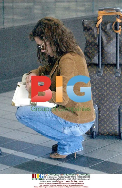 Britney Murphy Leaves LAX for Trip