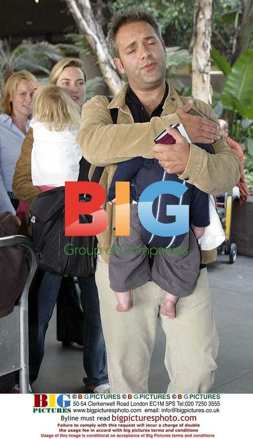 Kate Winslet and Family Arrive at LAX