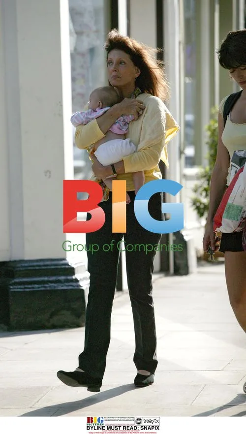 Gayle Hunnicut with Baby in London