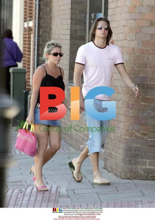 Lucy Benjamin with boyfriend at cafe