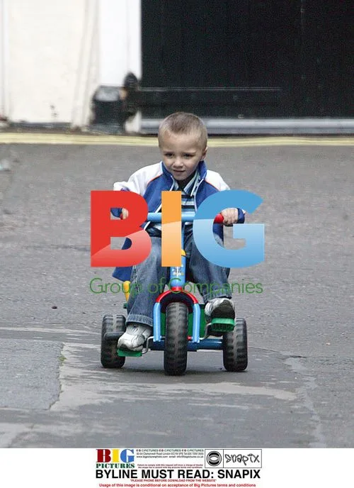 Madonna's Son Rocco Plays on Bike in London