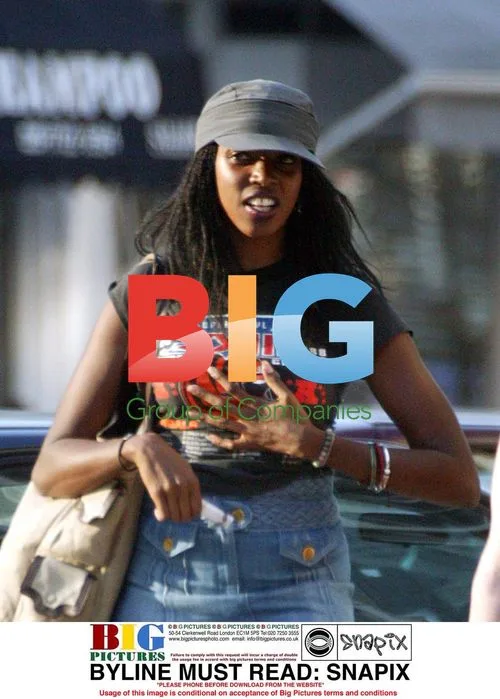TV Presenter Josie D'Arby Out with Friends