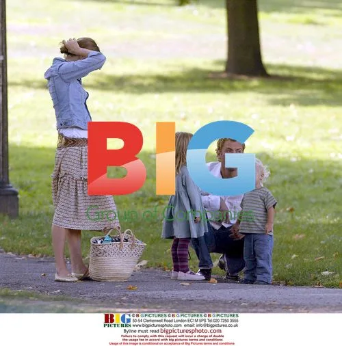 Jude Law with children in park