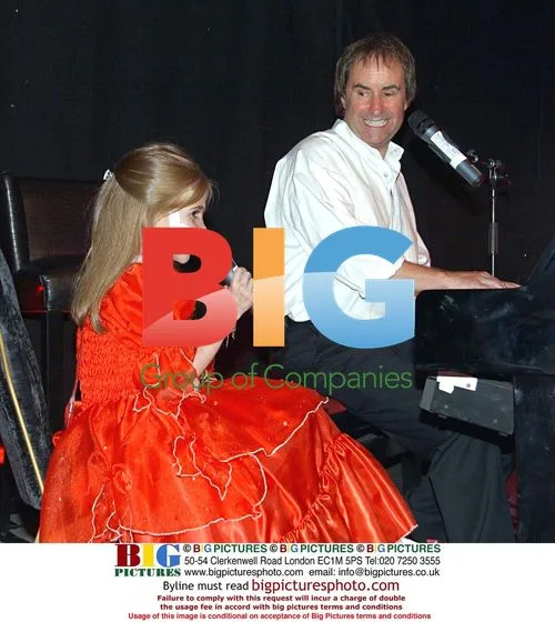 Chris De Burh Sings "Lady in Red" at Angel Ball