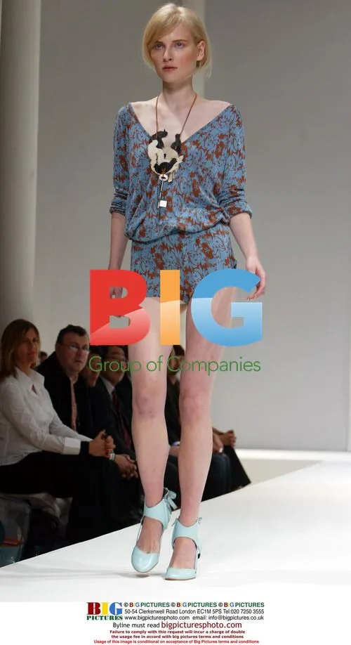 Models on Catwalk at 'Red or Dead' Show