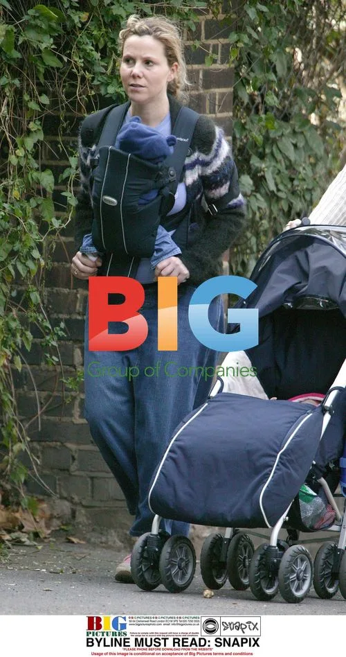 Sally Phillips out with baby and friend in North London