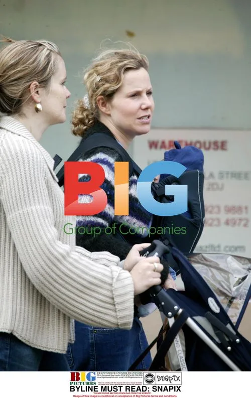Sally Phillips out with baby and friend