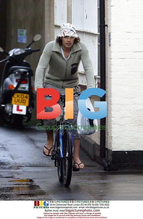 Russell Brand Riding Bike in London