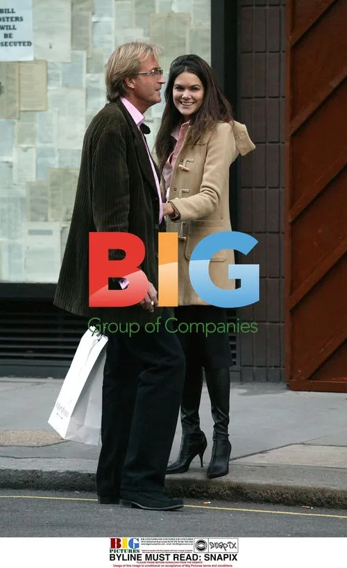 Joan Colin's Ex Seen with New Model