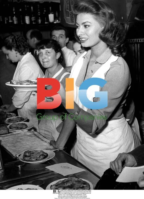 Sofia Loren Tries on Laroche Coat