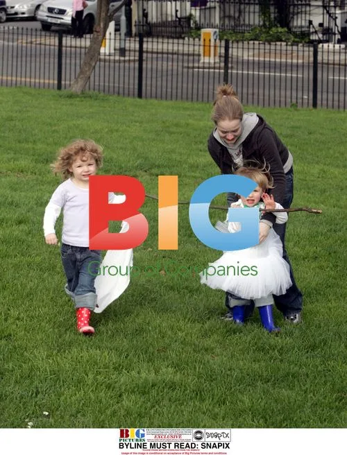Jools Oliver with daughters in London park