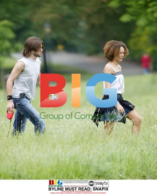 Alex Sibley and Melanie Hill Spotted Walking Dog