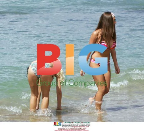 Michelle Marsh and Lucy Pinder on Caribbean Beach