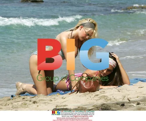 Michelle Marsh and Lucy Pinder at the Beach