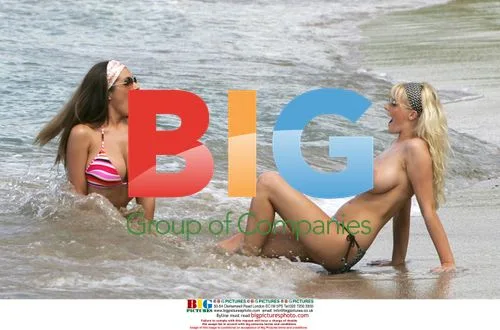 Michelle Marsh and Lucy Pinder on St. Lucia Beach