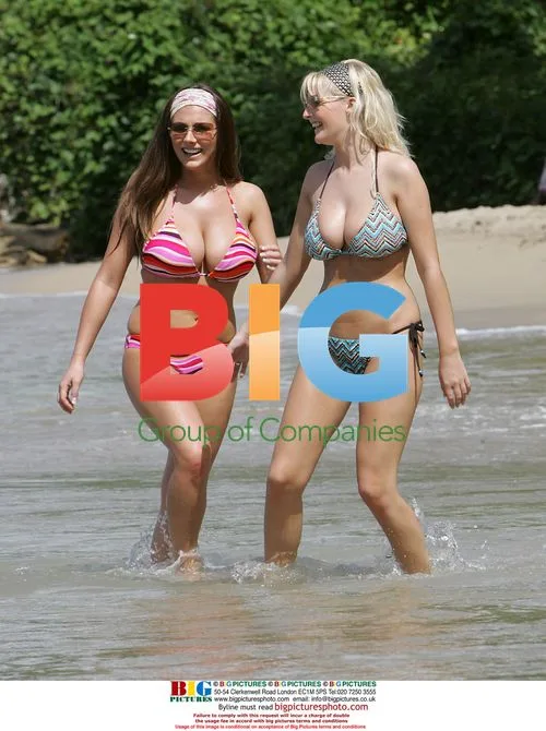 Glamour models on beach in St. Lucia