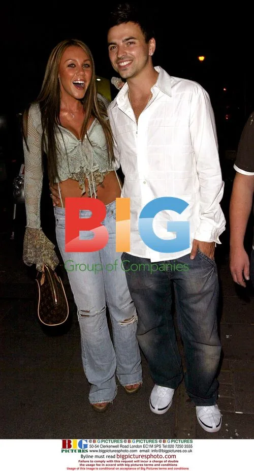 Liberty X's Michelle Heaton and boyfriend leaving nightclub