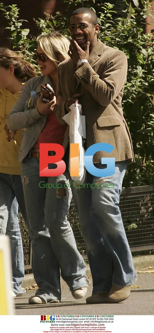 Billie Piper and Amadu Sowe stroll in London