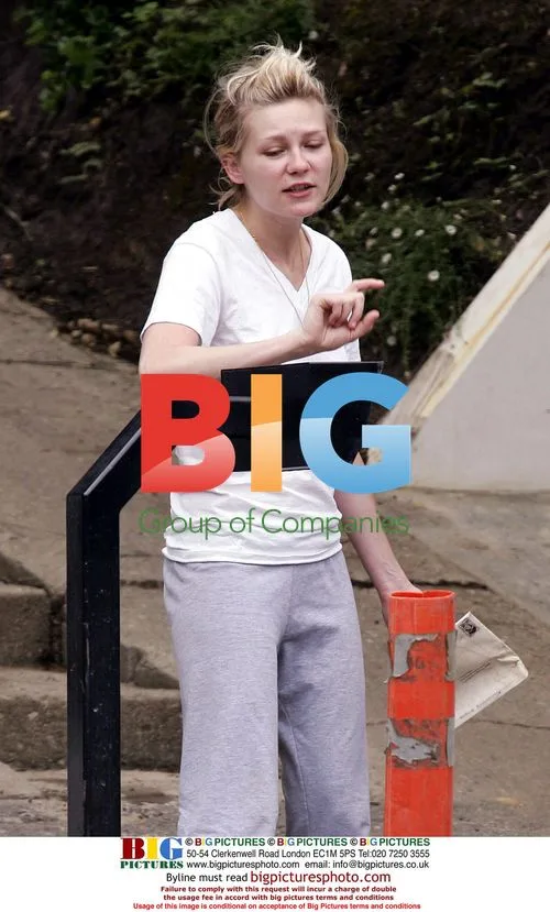Kirsten Dunst Grumpy Morning Candid