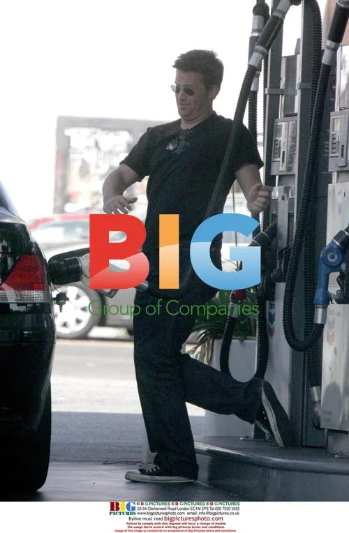 Matthew Perry Dances at Gas Station
