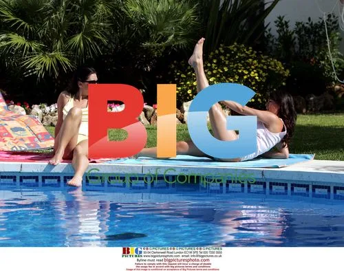 Lisa Scott Lee Relaxing by Pool