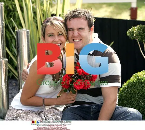 Coronation Street stars pose with Coronation Street rose