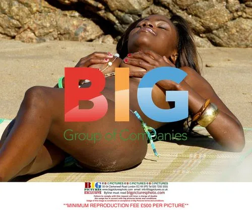 Big Brother's Makosi Sunbathing in France