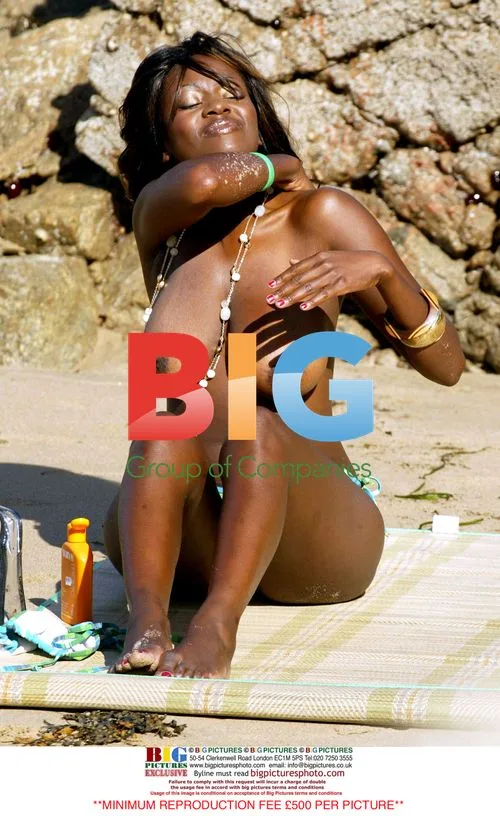 Makosi Musambasi Sunbathing in South Of France