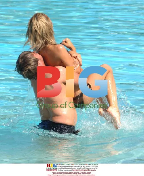Jenny Frost Relaxing in Hotel Pool