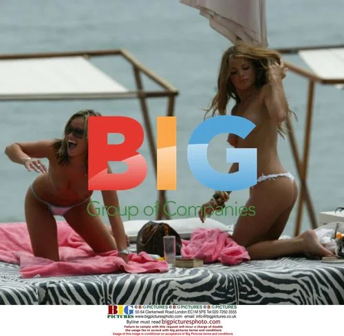 Singers Tanya and Shereen Relax by Pool in Gran Canaria
