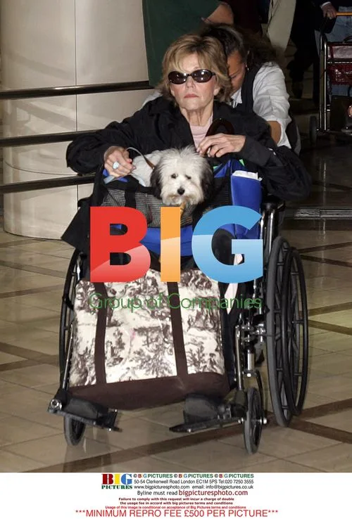 Jane Fonda wheeled into LAX