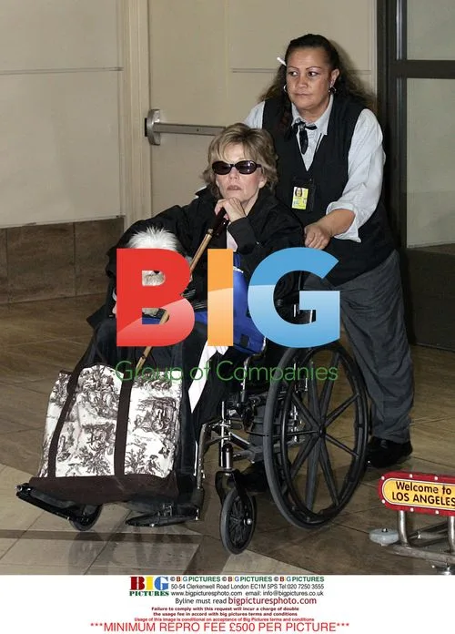 Jane Fonda Wheeled into LAX
