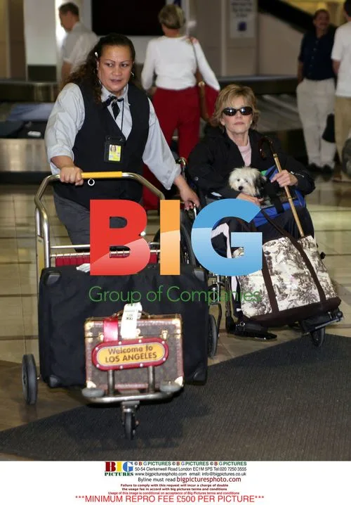 Jane Fonda Wheeled Into LAX