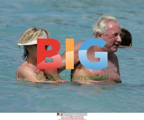 Michael Winner enjoying holiday