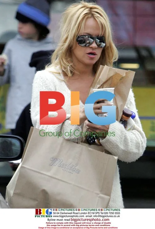 Pamela Anderson Spills Coffee