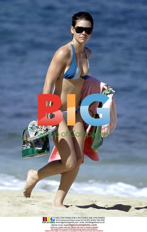 Evangeline Lilly Spends Afternoon Sunbathing