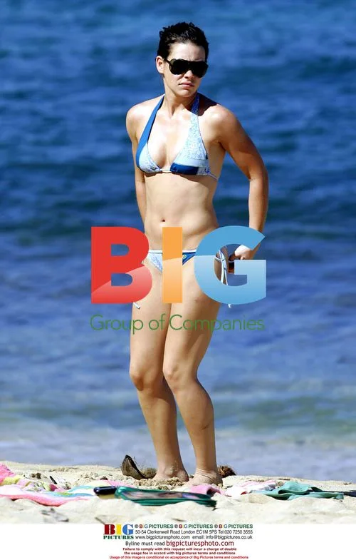 Evangeline Lilly Spends Afternoon Sunbathing