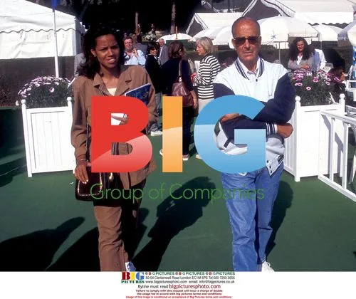 Dr.Iglesias Puga and wife Rona at golf tournament