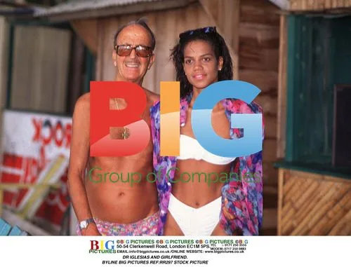 Dr Iglesias and girlfriend pose together