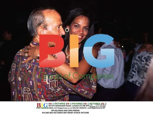 Dr Iglesias and Girlfriend Pose for Camera