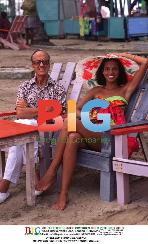 Dr Iglesias and Girlfriend Pose for Camera