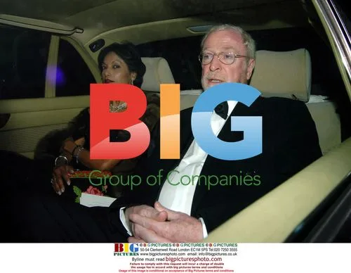 Michael Caine and wife arrive at Elton John party