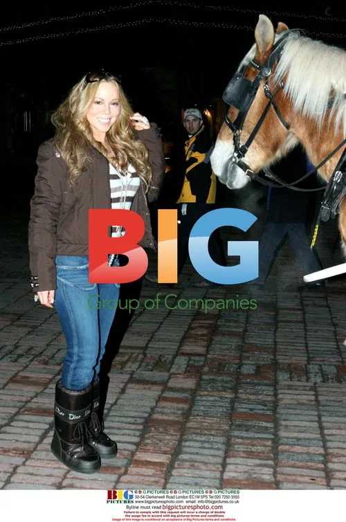 Mariah Carrey with dog and horse in Aspen